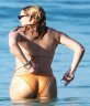  lokutus_impresionante_el_culo_de_mariah_maria_carey_robado_en_la_playa_mojado_por_el_mar.jpg 